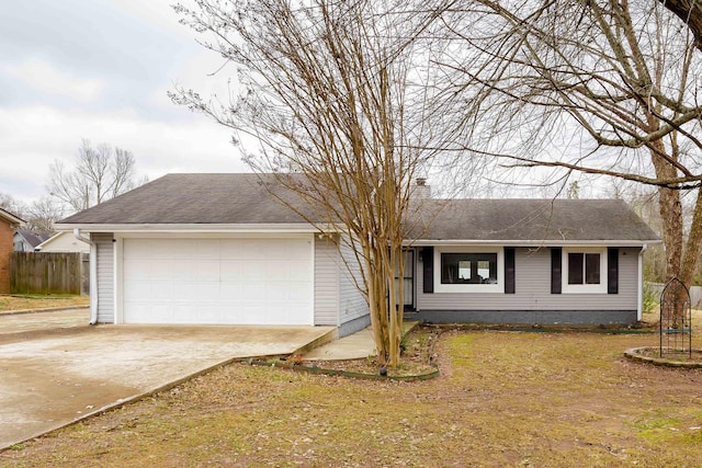 ranch-style house featuring a garage