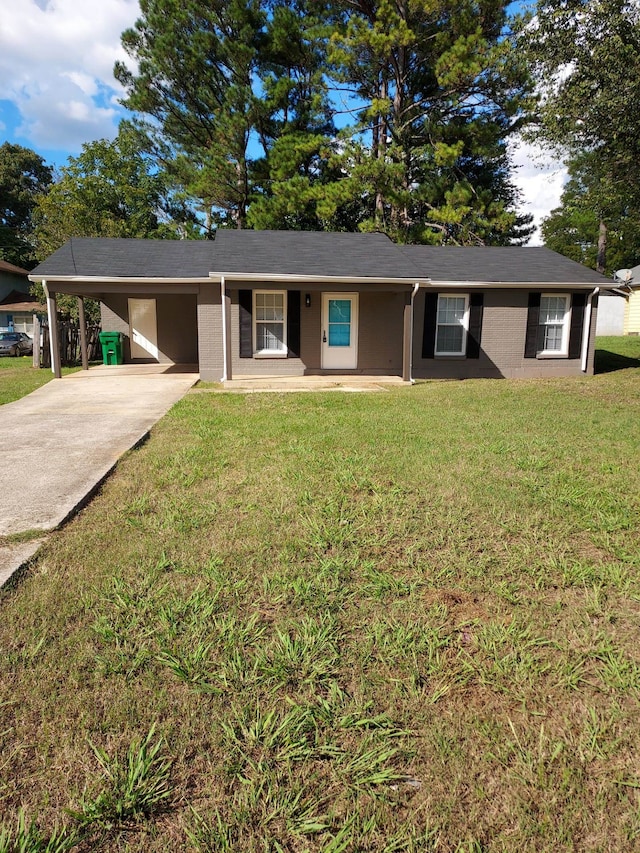 ranch-style home with a front yard, a porch, and a carport