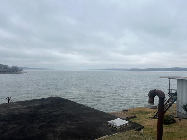 property view of water with a boat dock