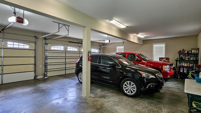 garage featuring a garage door opener