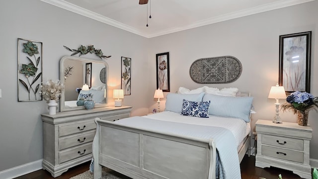 bedroom featuring baseboards, dark wood-style floors, a ceiling fan, and crown molding