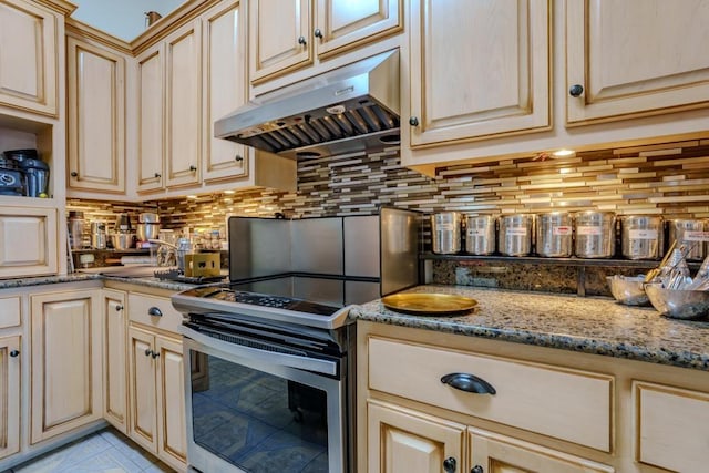 kitchen featuring decorative backsplash, light tile patterned floors, stone countertops, and stainless steel electric stove