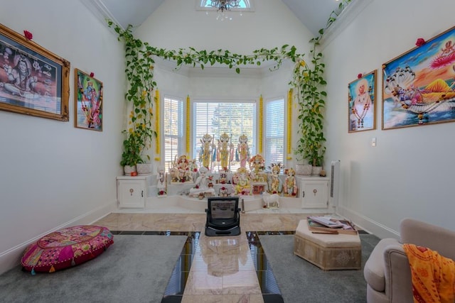 sitting room with lofted ceiling