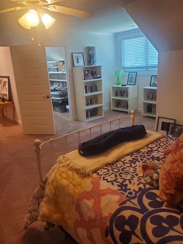 bedroom with ceiling fan and carpet floors