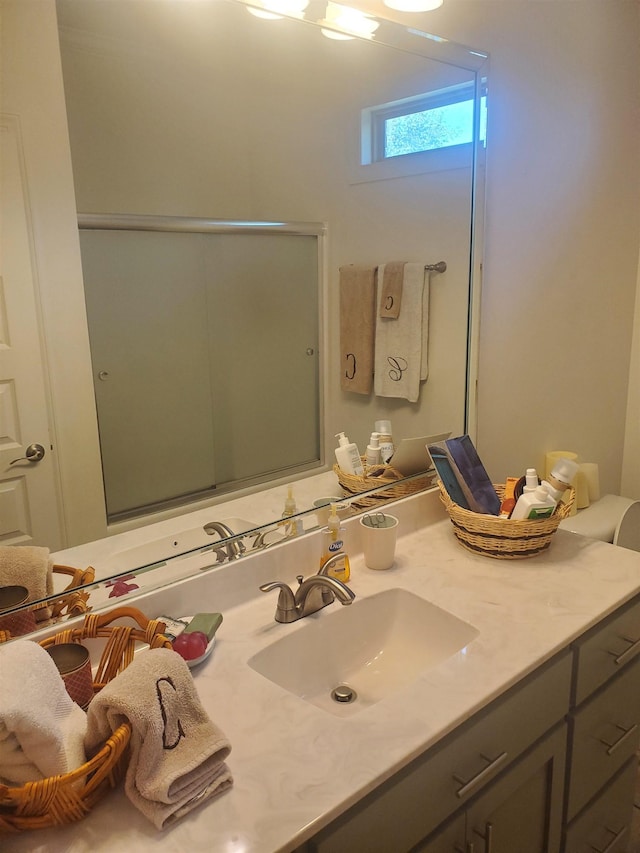 bathroom featuring vanity and walk in shower