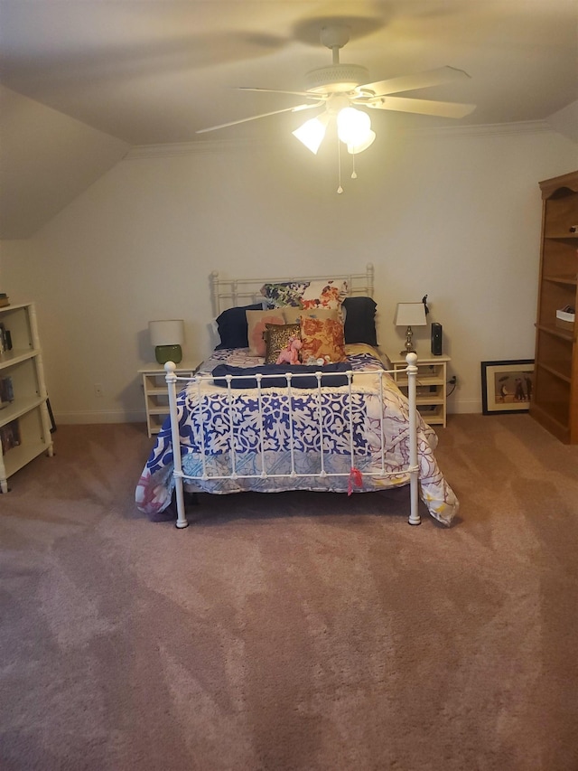 bedroom with carpet, ceiling fan, lofted ceiling, and ornamental molding