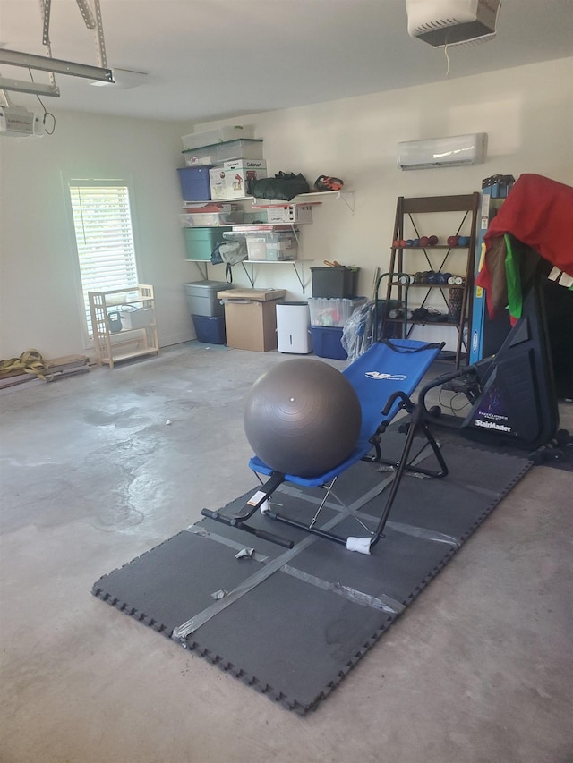 exercise room featuring a wall unit AC