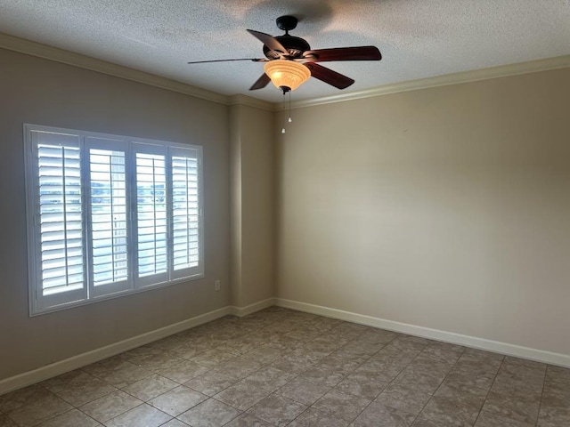  - empty room featuring a textured ceiling, crown molding, ceiling fan, and baseboards