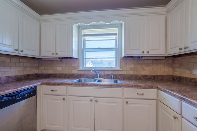 kitchen featuring dishwasher, white cabinets, backsplash, and a sink