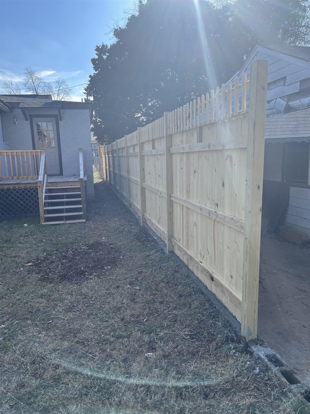 view of yard with a deck