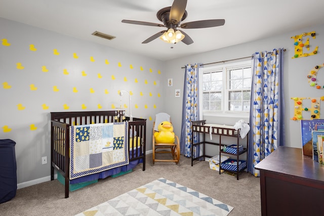  - carpeted bedroom with baseboards, visible vents, and ceiling fan
