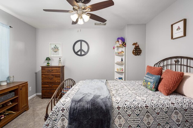  - carpeted bedroom with a ceiling fan, baseboards, and visible vents