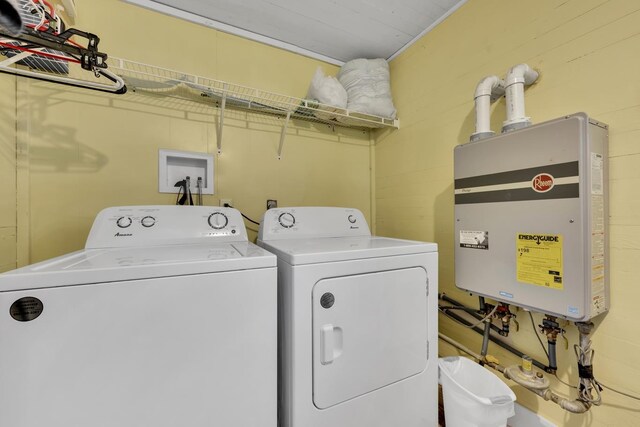 - washroom with washing machine and dryer and water heater