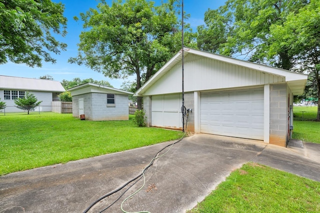  - detached garage with concrete driveway