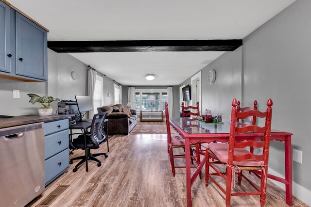  - dining room with light wood-type flooring, beamed ceiling, and an office area