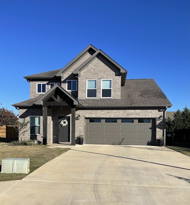 craftsman inspired home with a garage