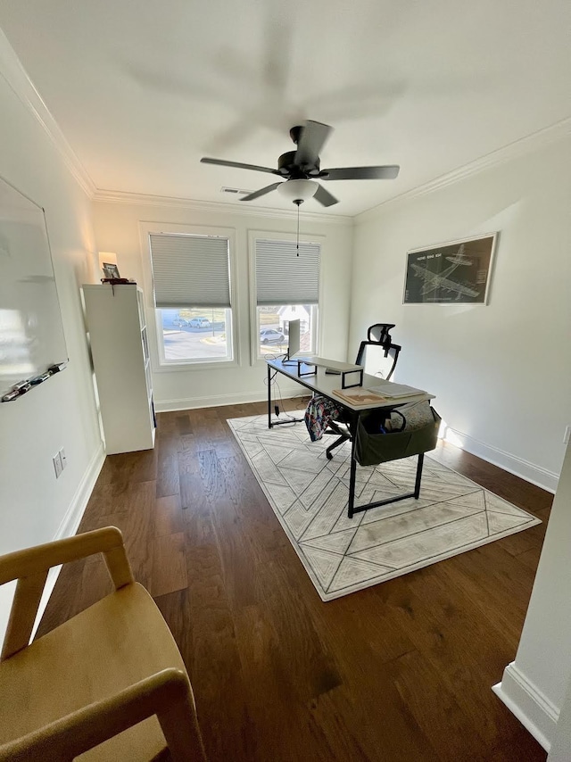 home office featuring ceiling fan, dark wood-type flooring, and ornamental molding