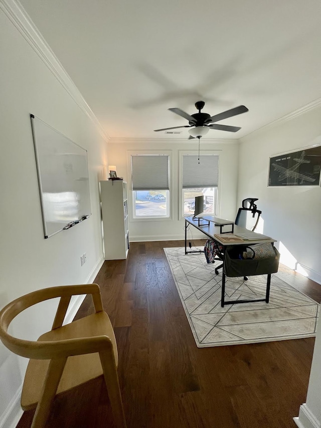 home office with ceiling fan, dark hardwood / wood-style flooring, and crown molding