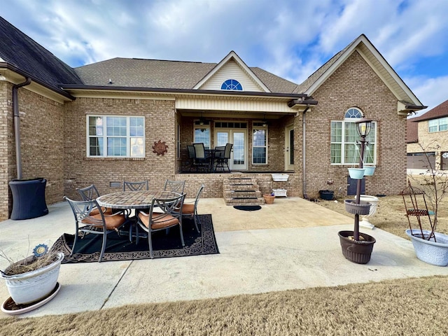 rear view of house with a patio