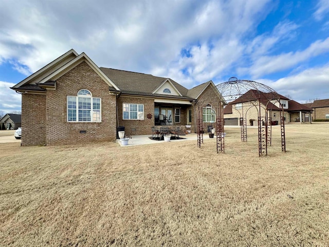 view of front of property with a gazebo and a patio