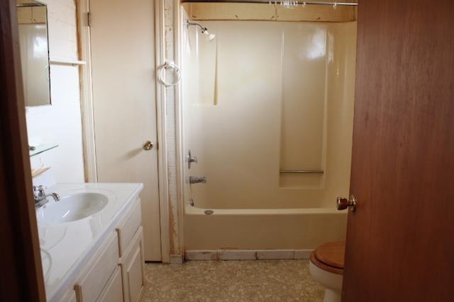 full bathroom featuring shower / bathing tub combination, vanity, and toilet