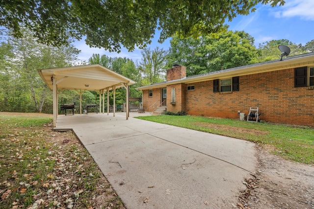 exterior space with a carport