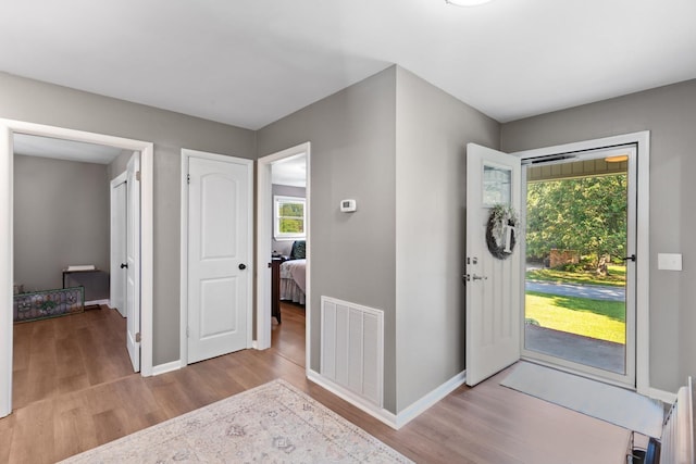 foyer entrance featuring light hardwood / wood-style floors