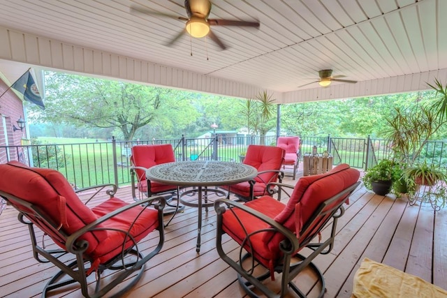 wooden deck with ceiling fan