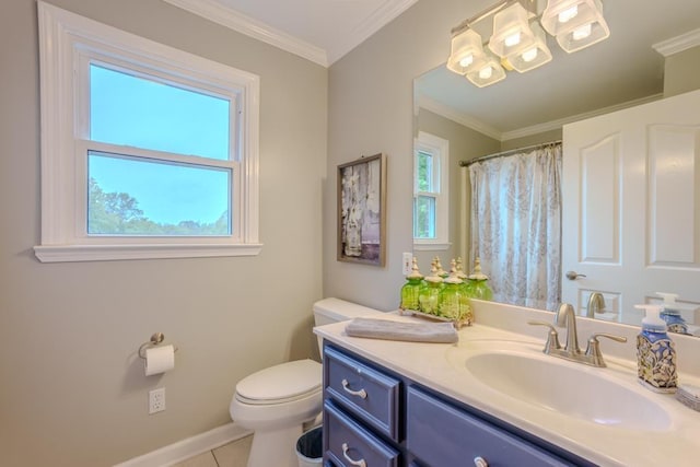 bathroom featuring crown molding, plenty of natural light, vanity, and tile patterned flooring