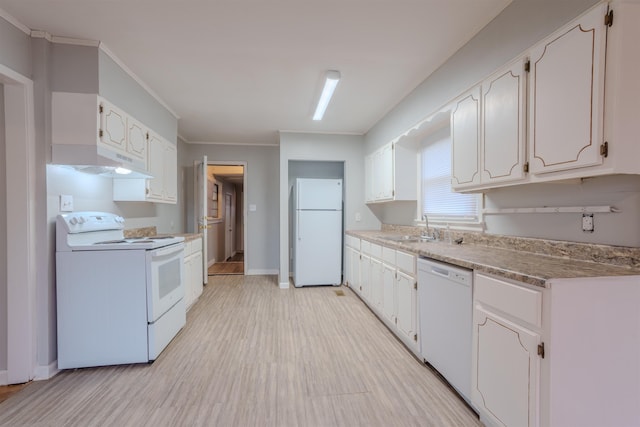 kitchen with white appliances, crown molding, white cabinets, and a sink