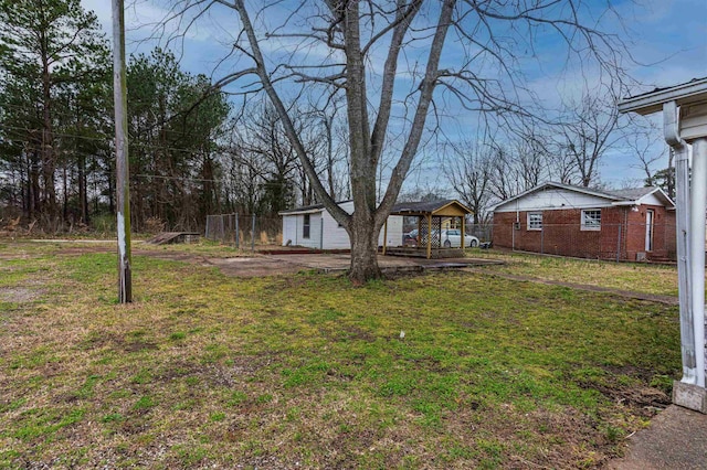 view of yard featuring fence