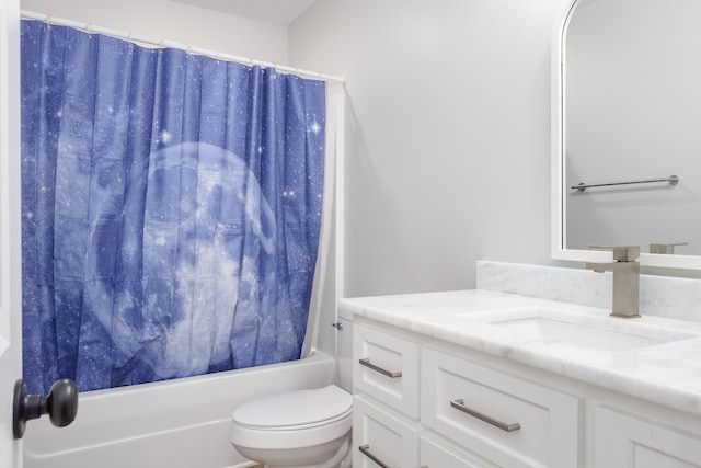 full bathroom featuring vanity, shower / bath combination with curtain, and toilet