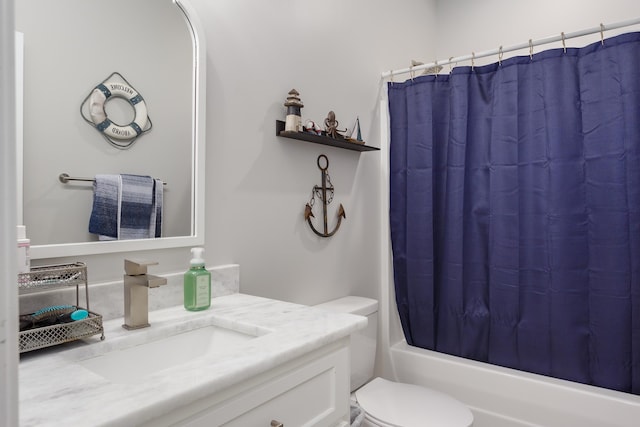 full bathroom with shower / bath combination with curtain, vanity, and toilet