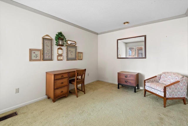 carpeted office featuring visible vents, crown molding, and baseboards