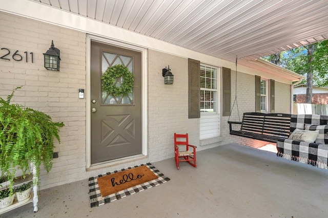 entrance to property with a porch