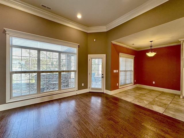 doorway featuring light wood-type flooring and ornamental molding