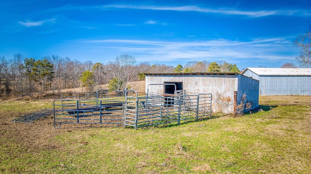 view of outbuilding with a rural view