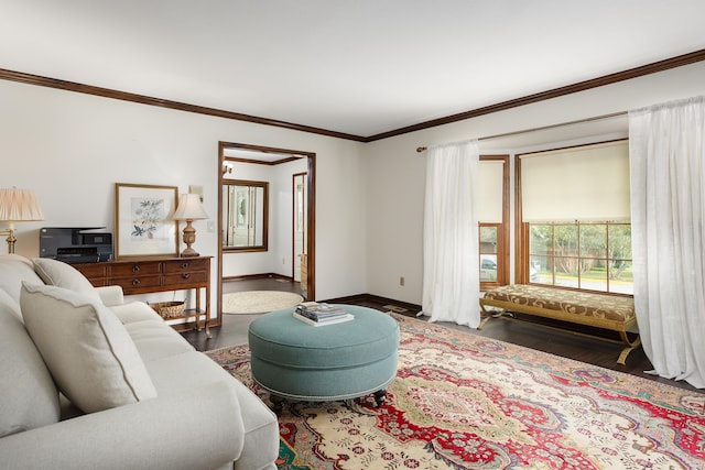 living room with dark wood-type flooring and crown molding