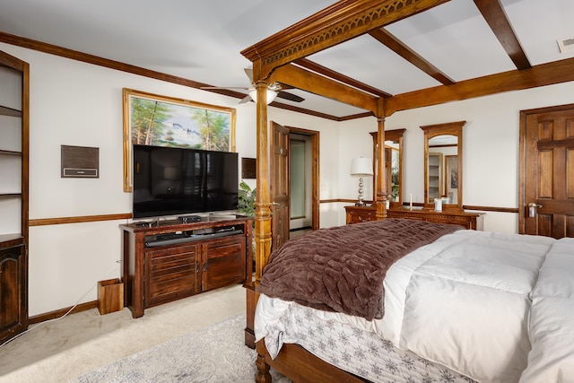 carpeted bedroom featuring ceiling fan, beam ceiling, and crown molding