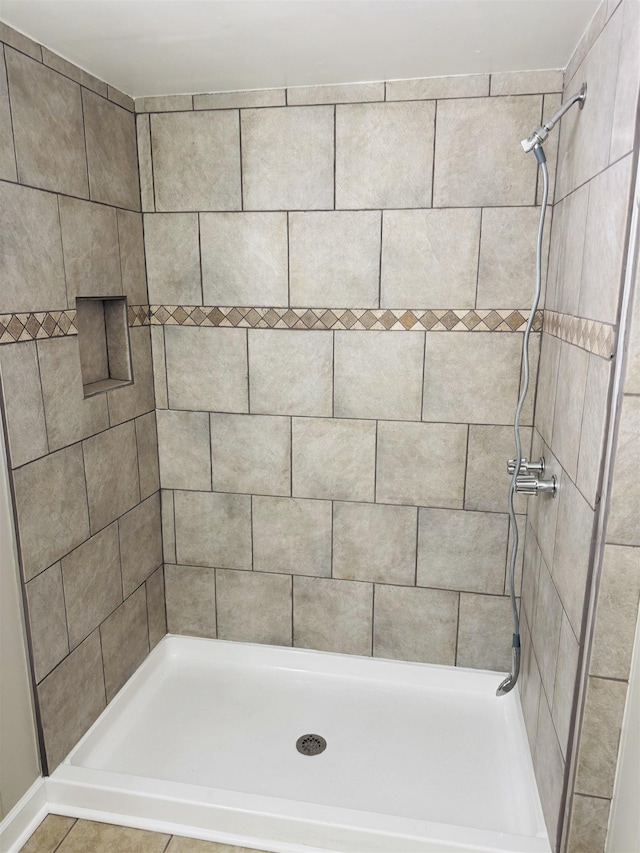 bathroom featuring a shower stall