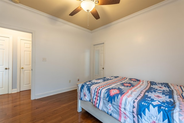  - bedroom with ornamental molding, wood-type flooring, and ceiling fan