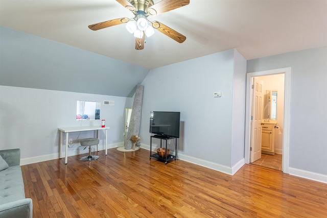  - office featuring light wood finished floors, ceiling fan, and lofted ceiling