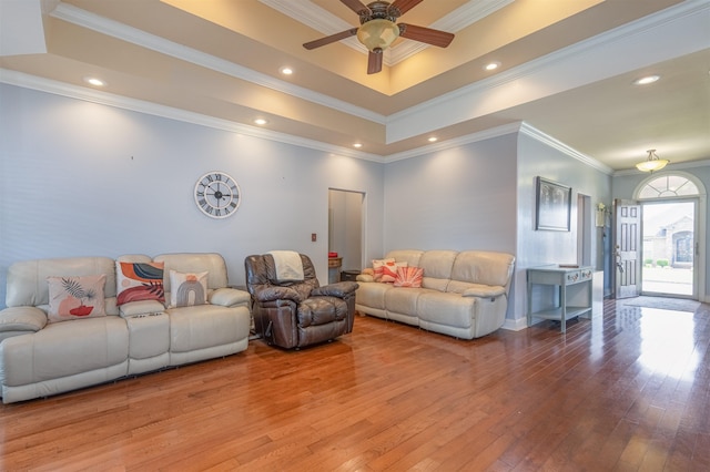  - living room with hardwood / wood-style floors, a ceiling fan, ornamental molding, and recessed lighting