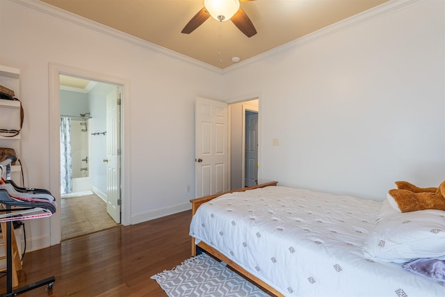  - bedroom featuring ornamental molding, wood finished floors, a ceiling fan, and ensuite bathroom