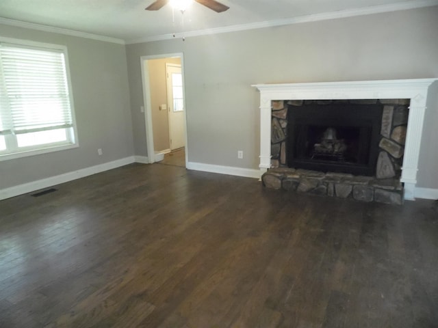  - unfurnished living room featuring wood finished floors, ornamental molding, a ceiling fan, and a fireplace