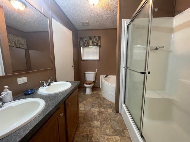 full bathroom with toilet, vanity, shower with separate bathtub, and a textured ceiling