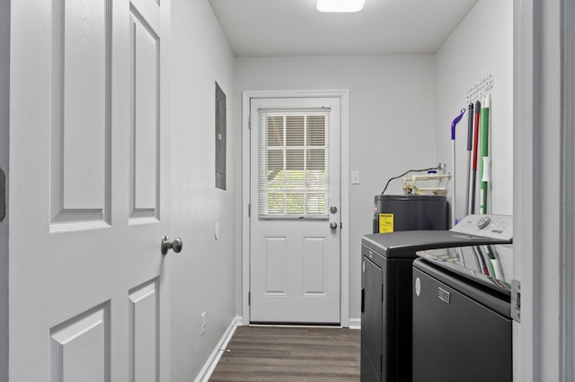 laundry room with separate washer and dryer, water heater, baseboards, dark wood-style flooring, and laundry area