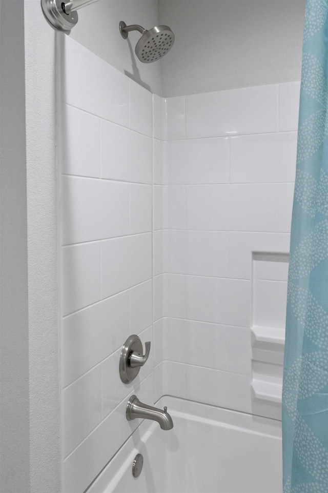 full bath with shower / bath combination with curtain