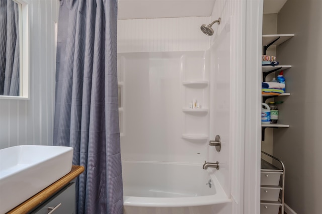 full bathroom with shower / bath combo and vanity