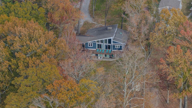 bird's eye view featuring a forest view